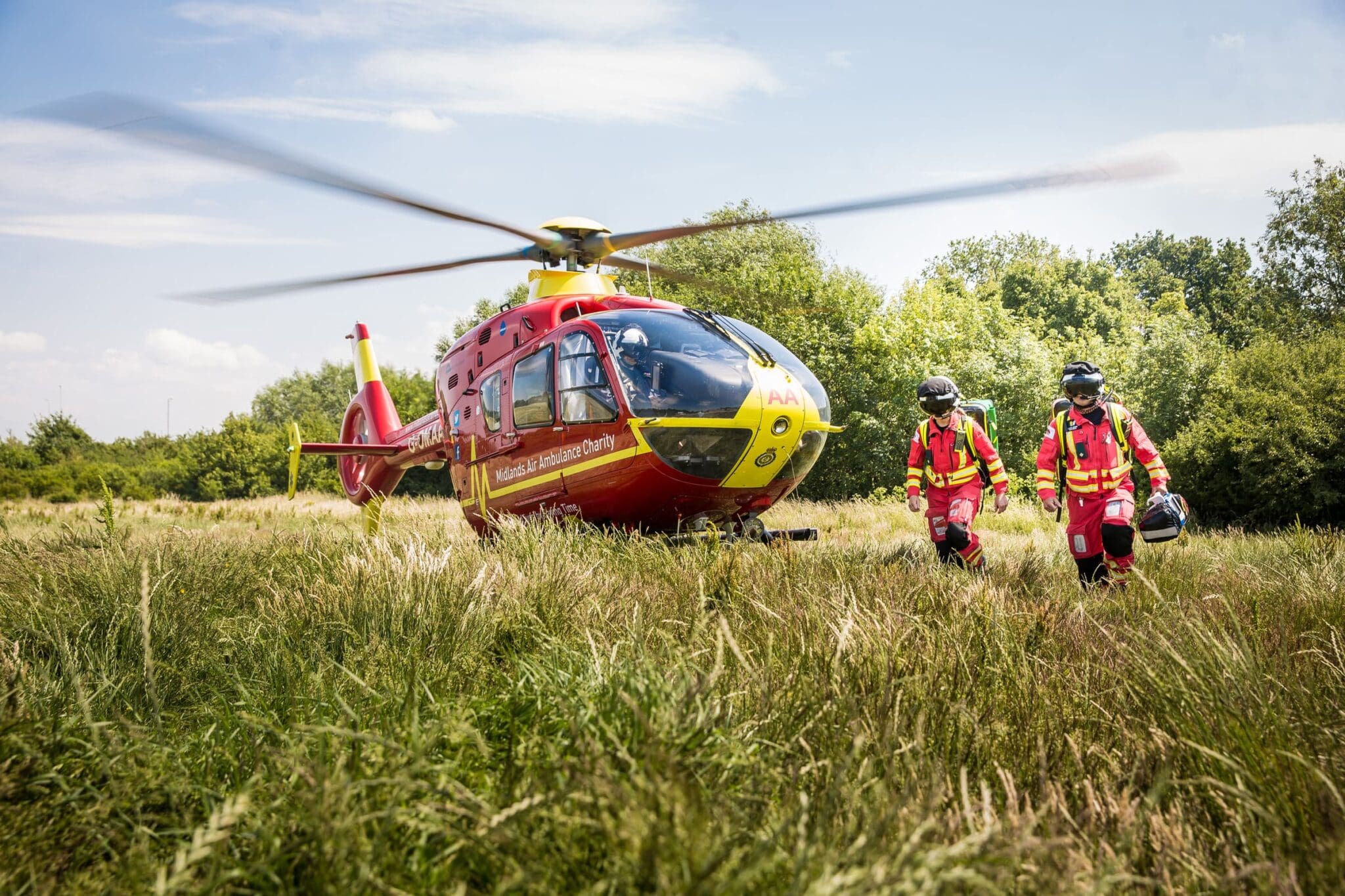 Midlands Air Ambulance Team Walking Away From Helicopter