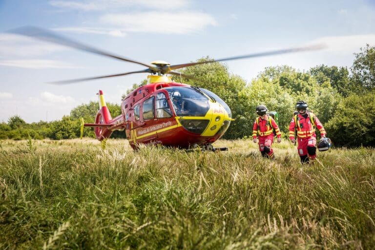 Midlands Air Ambulance Team Walking Away From Helicopter