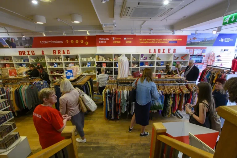 Maac Hereford People Are Shopping In A Clothing Store With A Lot Of Clothes