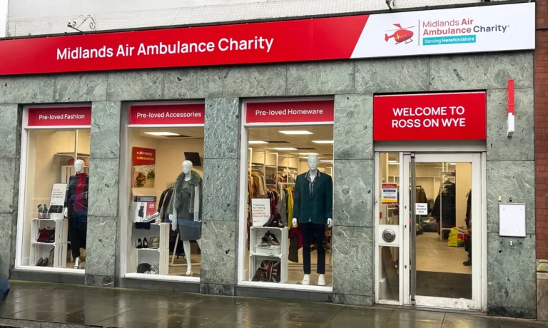 The front of the Midlands Air Ambulance charity shop in Ross-On-Wye, with two male mannequins in the window.