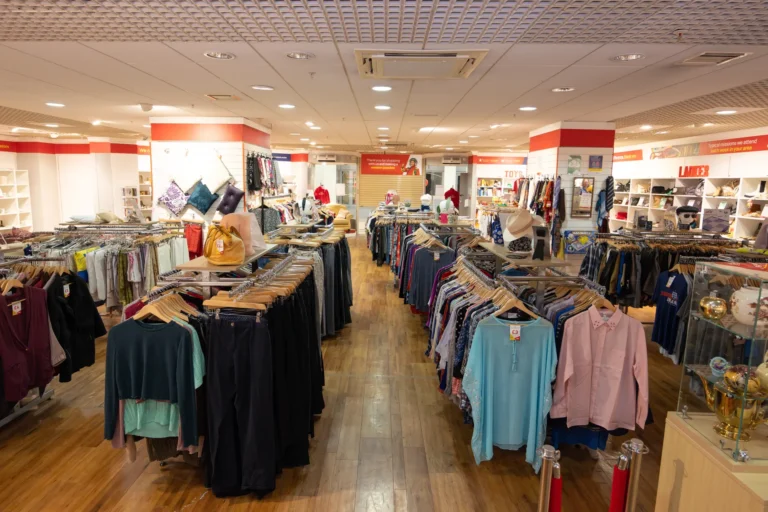 Maac Stoke View Of A Clothing Store With A Variety Of Clothes On Racks 1