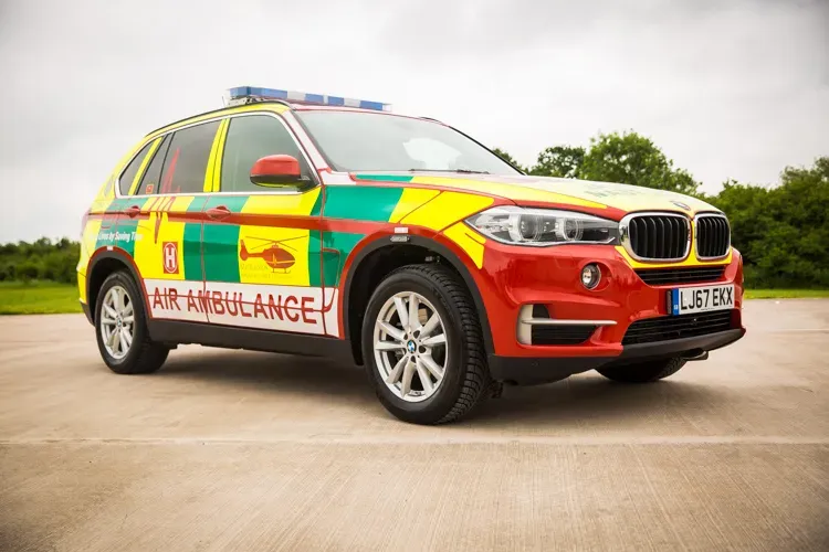Maac A Close Up Of A Car With A Police Car On The Side