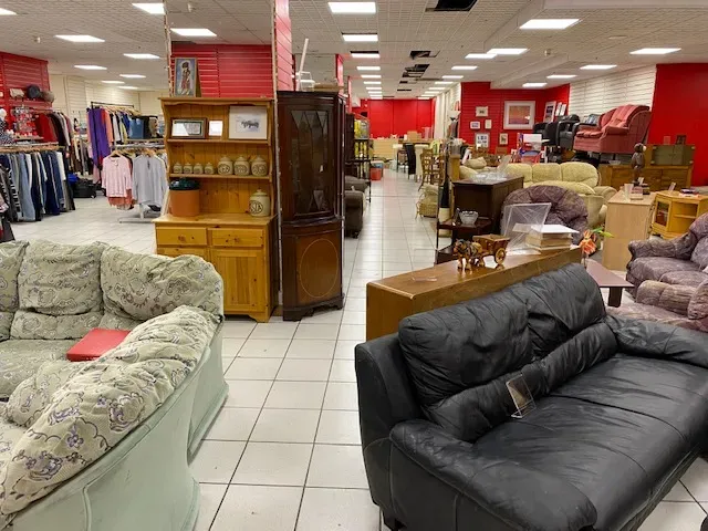 Maac Furniture Store With A Lot Of Furniture And A Large Display Case