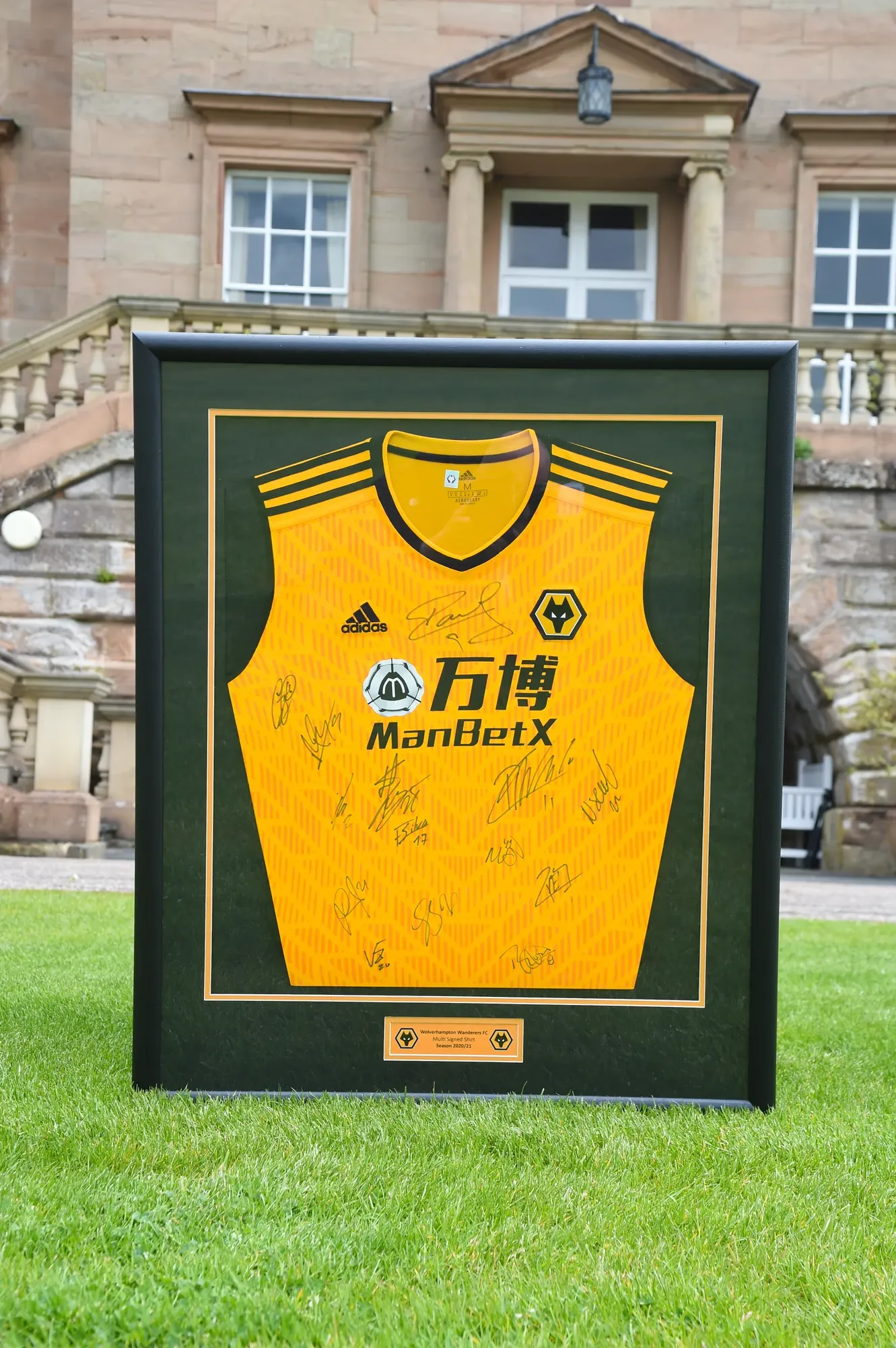 Maac Picture Of A Framed Jersey With A Signed Jersey
