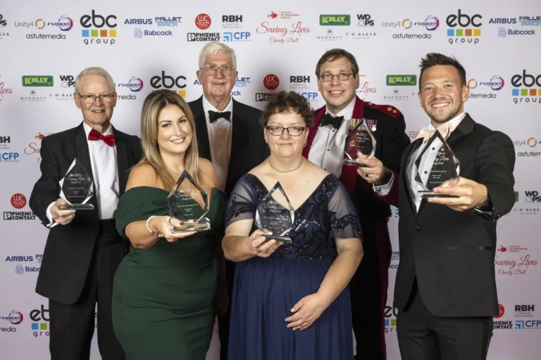 Maac Several People Posing For A Photo With Their Awards