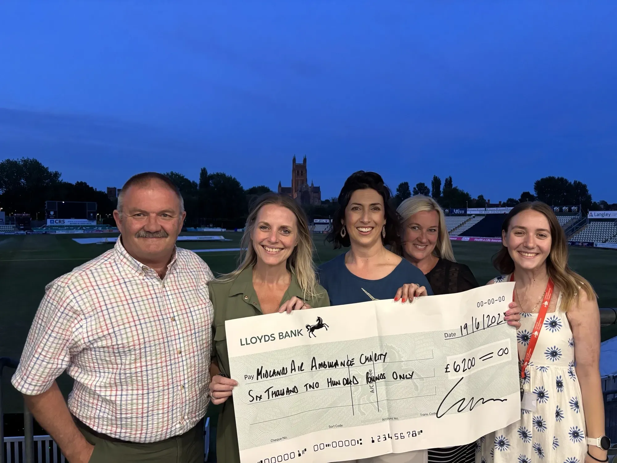 Maac Several People Standing Together Holding A Check For 5 000