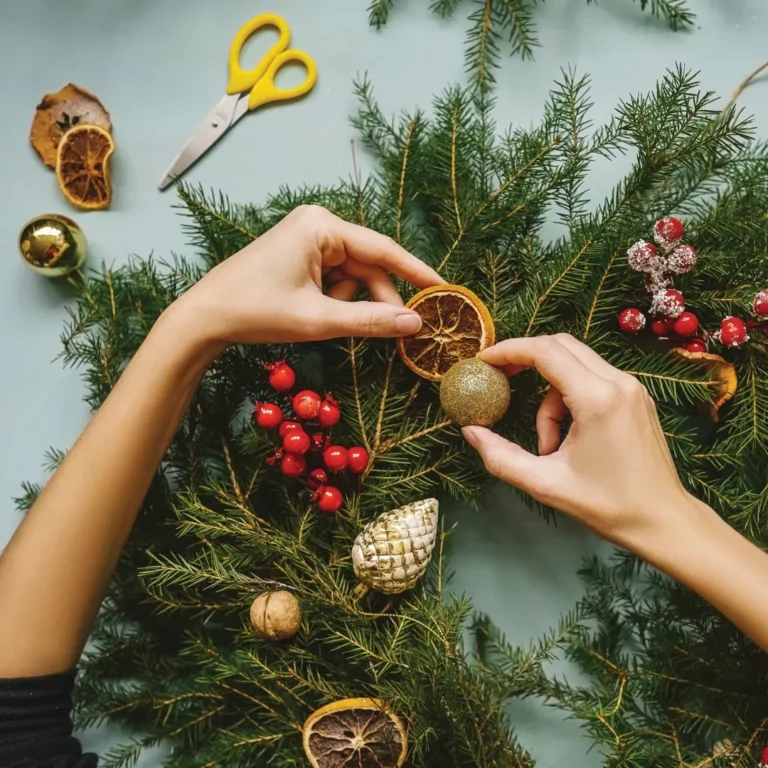 Maac Someone Is Decorating A Wreath With Pine Cones And Other Decorations