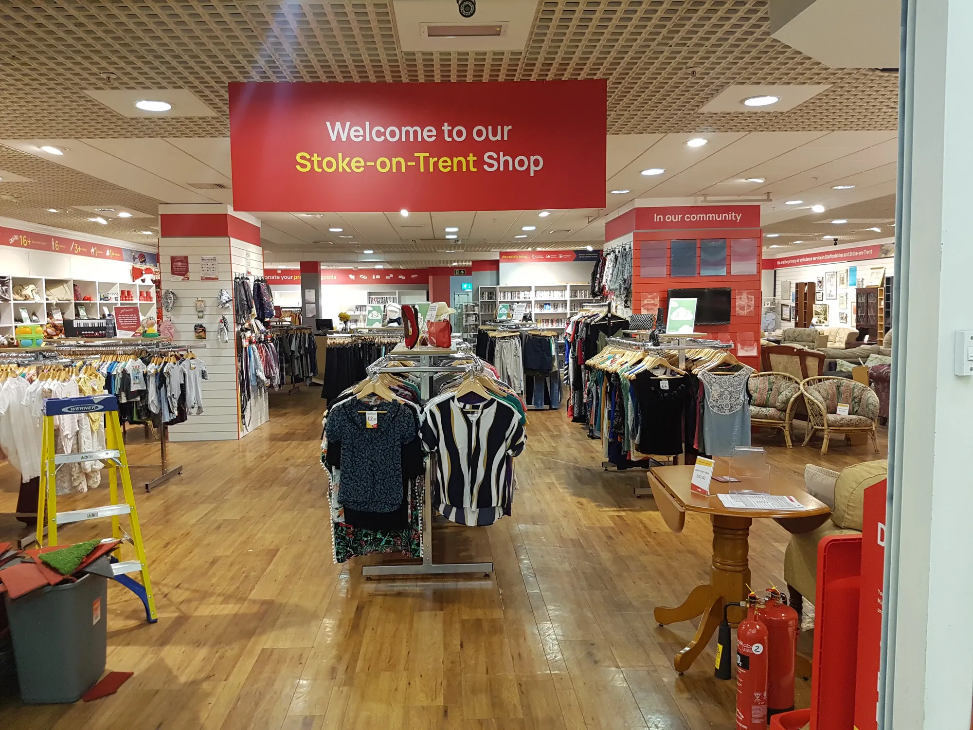Maac Store With Clothes And Clothing Racks In A Store