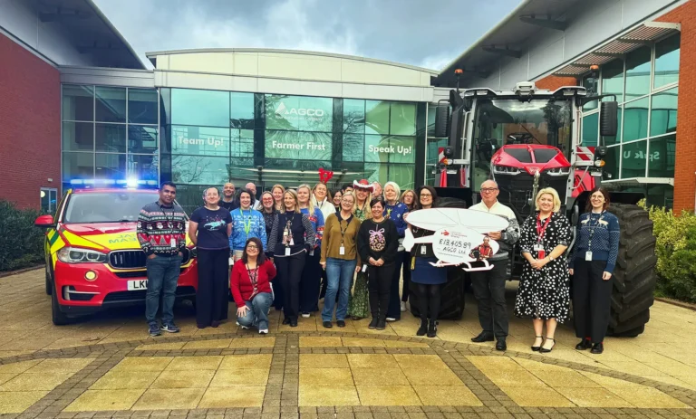 Maac There Are Many People Standing In Front Of A Fire Truck