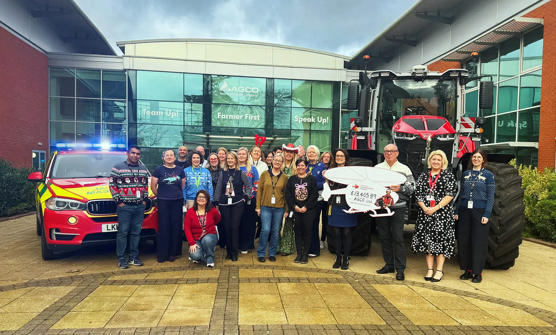 Maac There Are Many People Standing In Front Of A Fire Truck