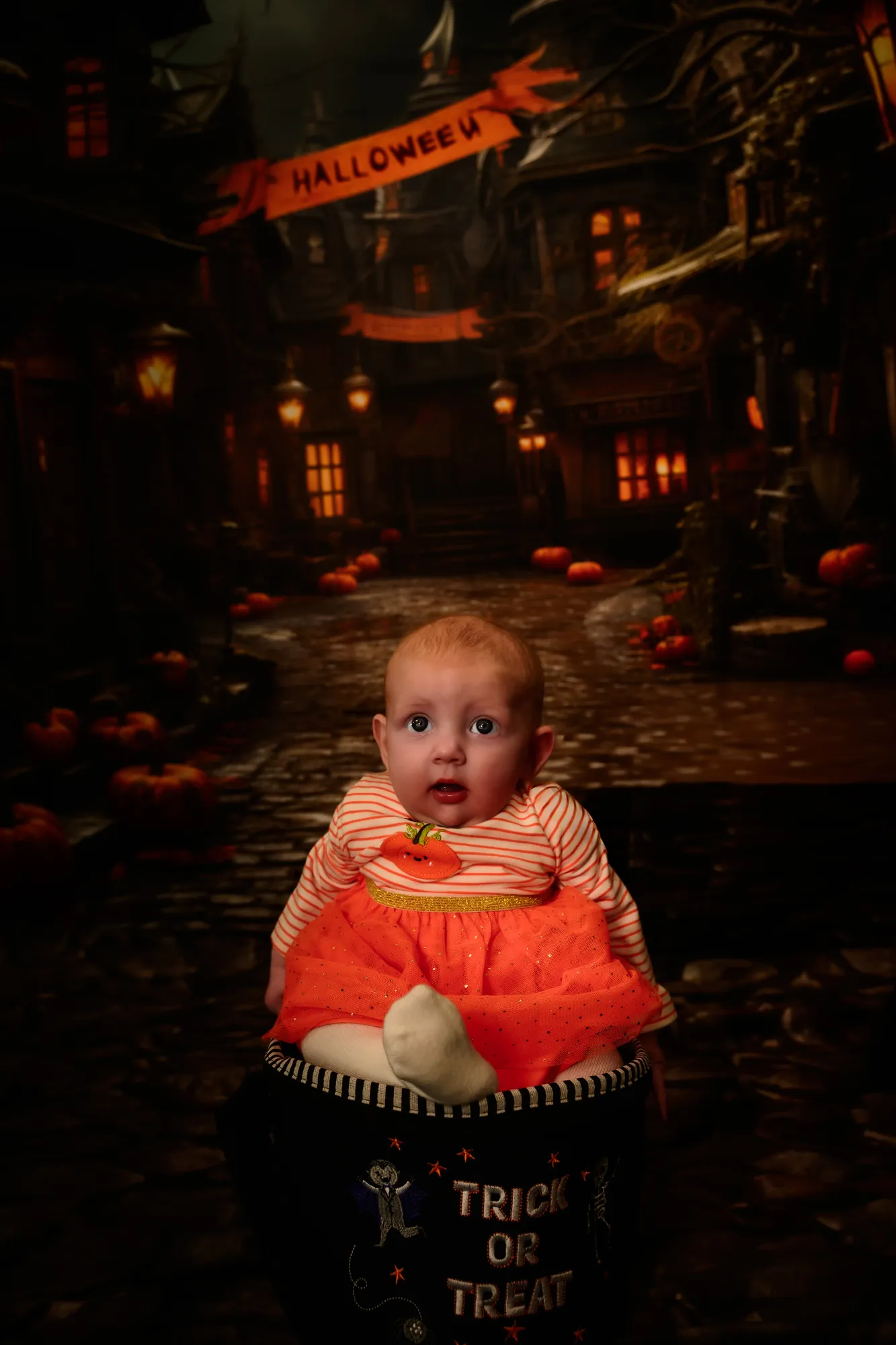 Maac There Is A Baby Sitting In A Basket With A Trick On It