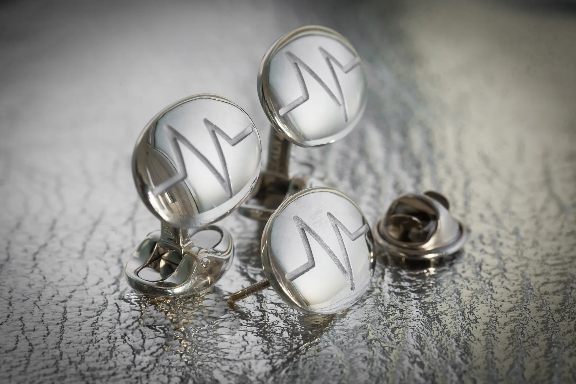 Maac Three Cufflinks With The Letters A And A Z On Them