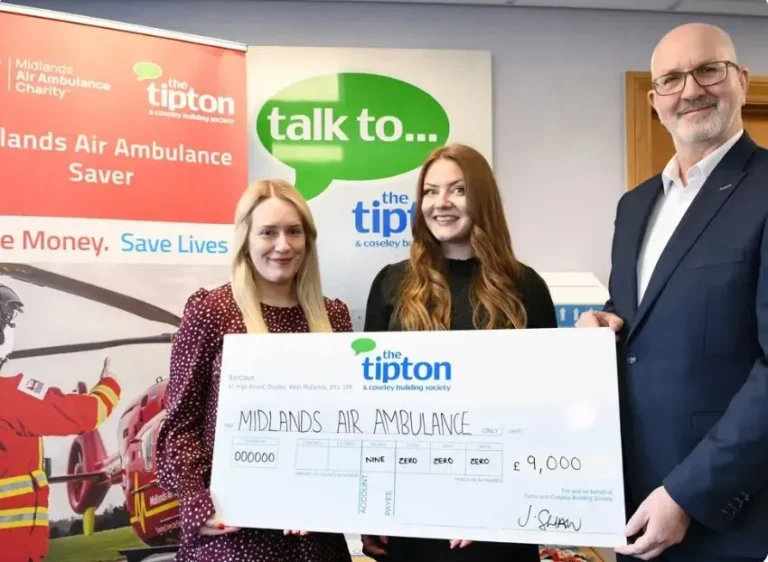 Maac Two Women And A Man Holding A Check For A Donation