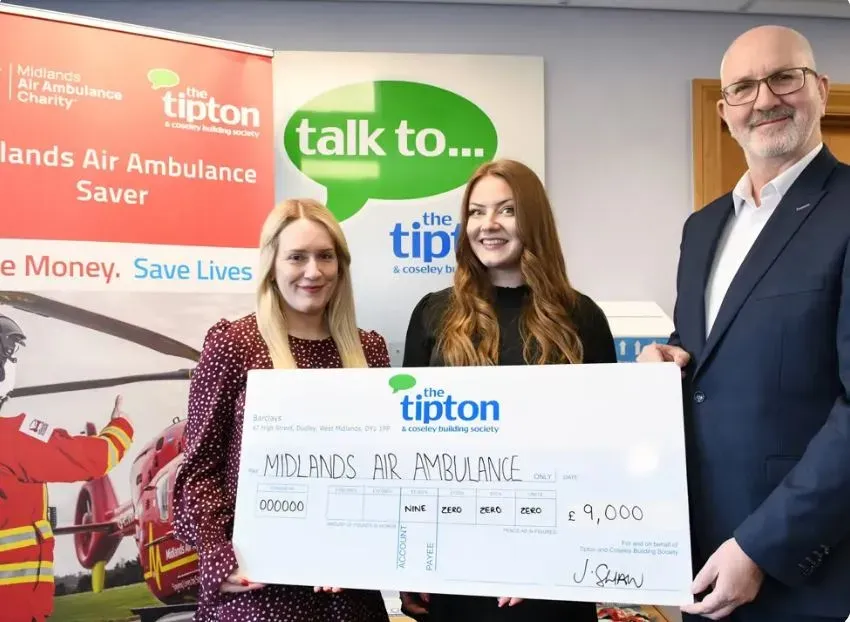 Maac Two Women And A Man Holding A Check For A Donation