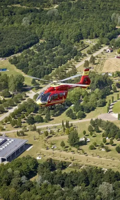 Maac Staffordshire Helicopter Flying Over A Large Grassy Area With A River In The Background 1024x683 Copy